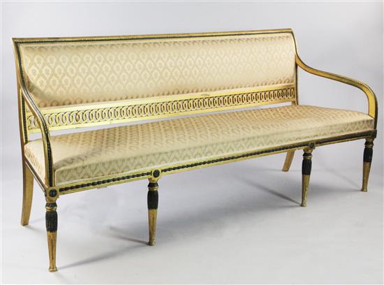 A George III blue painted and gilt three seat canapé,